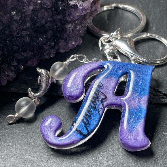 Artisan Accessories - Clear Quartz Purple and Blue 
Letter “A” Courage Keychain With Dolphin Charm